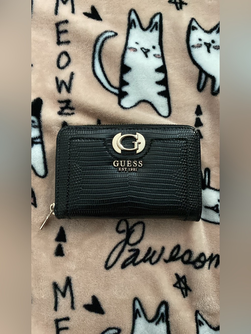 Guess black medium wallet with gold hardware.